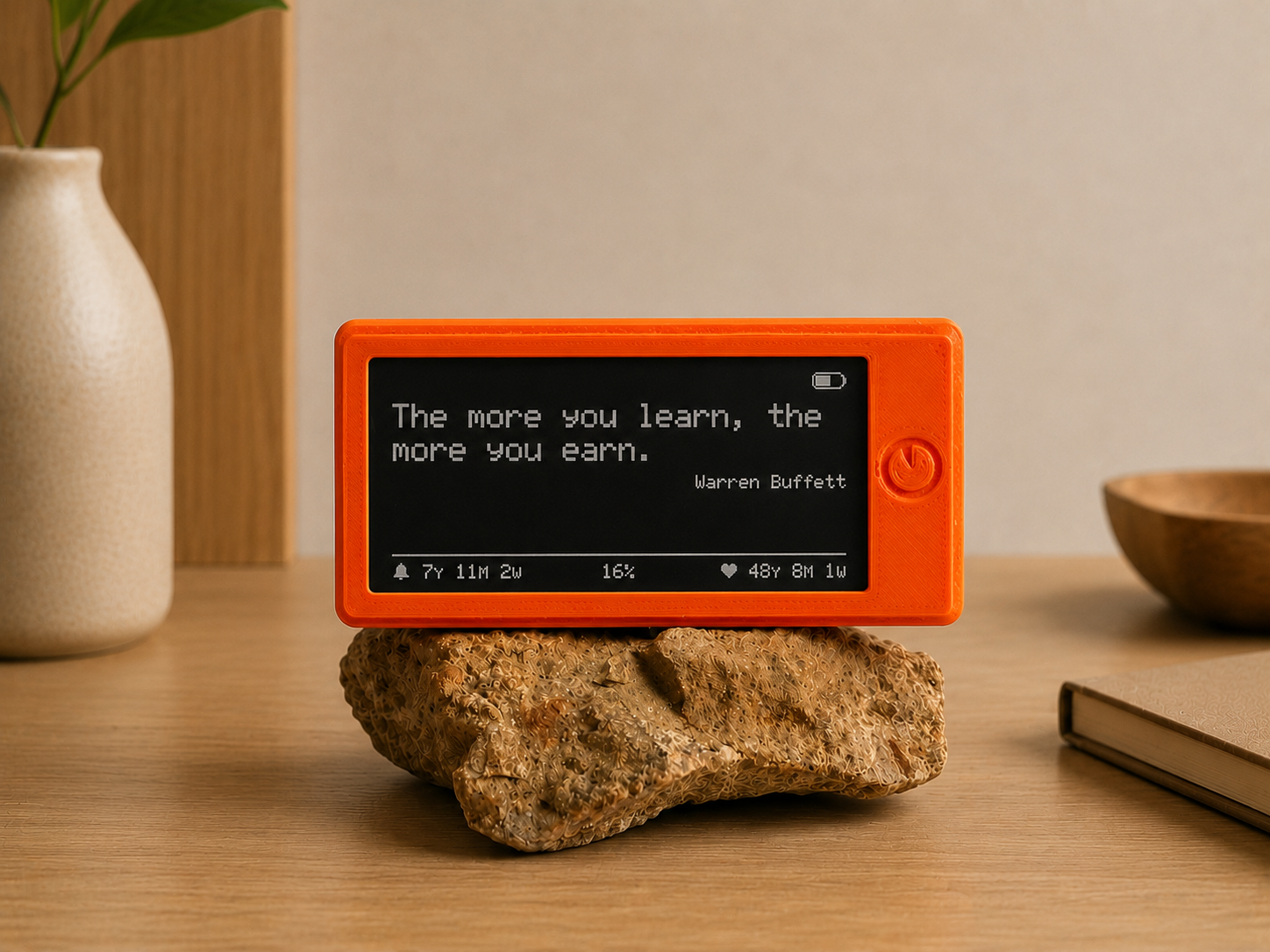 Freedom Clock e-ink display showing a motivational quote